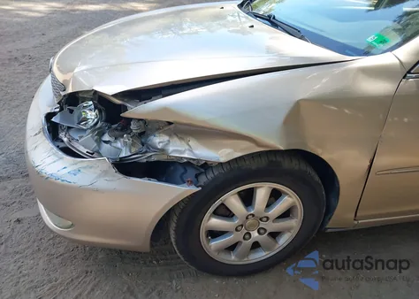 2003 Toyota Camry Xle z USA, uszkodzony, nr VIN JTDBE30K730164346